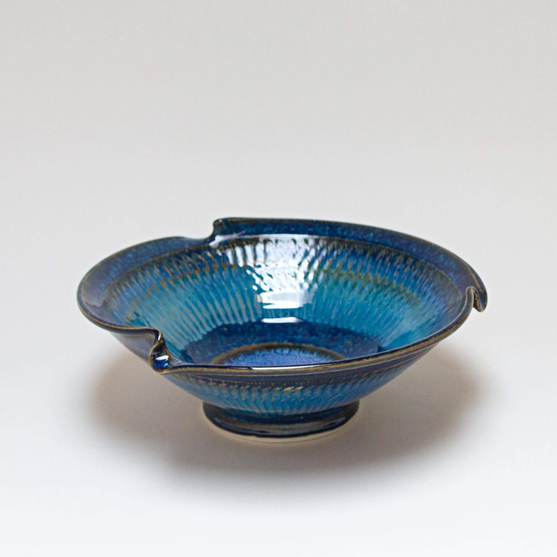 Handmade Pottery Signature Wave Bowl in Cobalt Purple pattern made by Carroccia Tony  in Italy