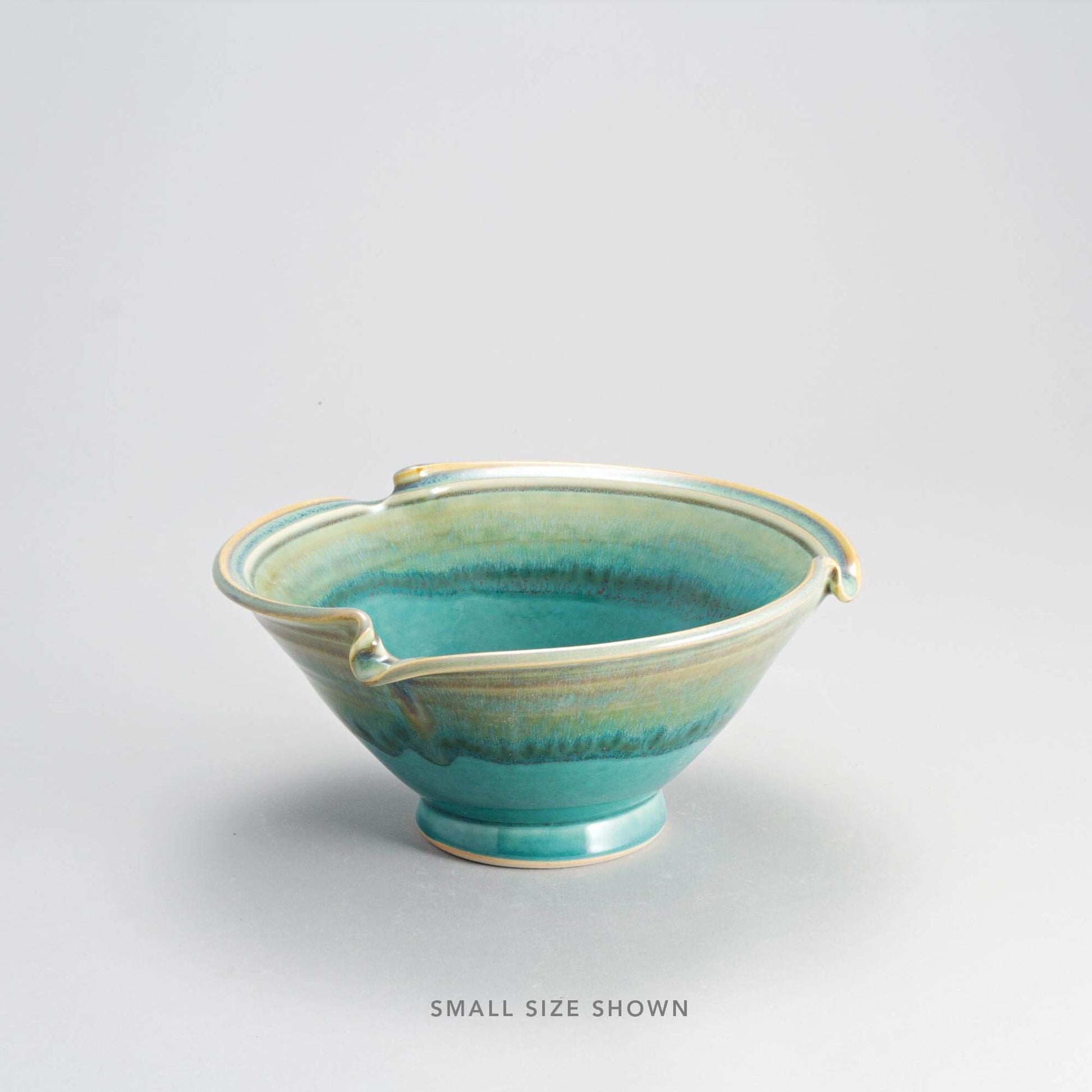 Handmade Pottery Signature Wave Bowl in Green Oribe pattern made by Carroccia Tony  in Italy