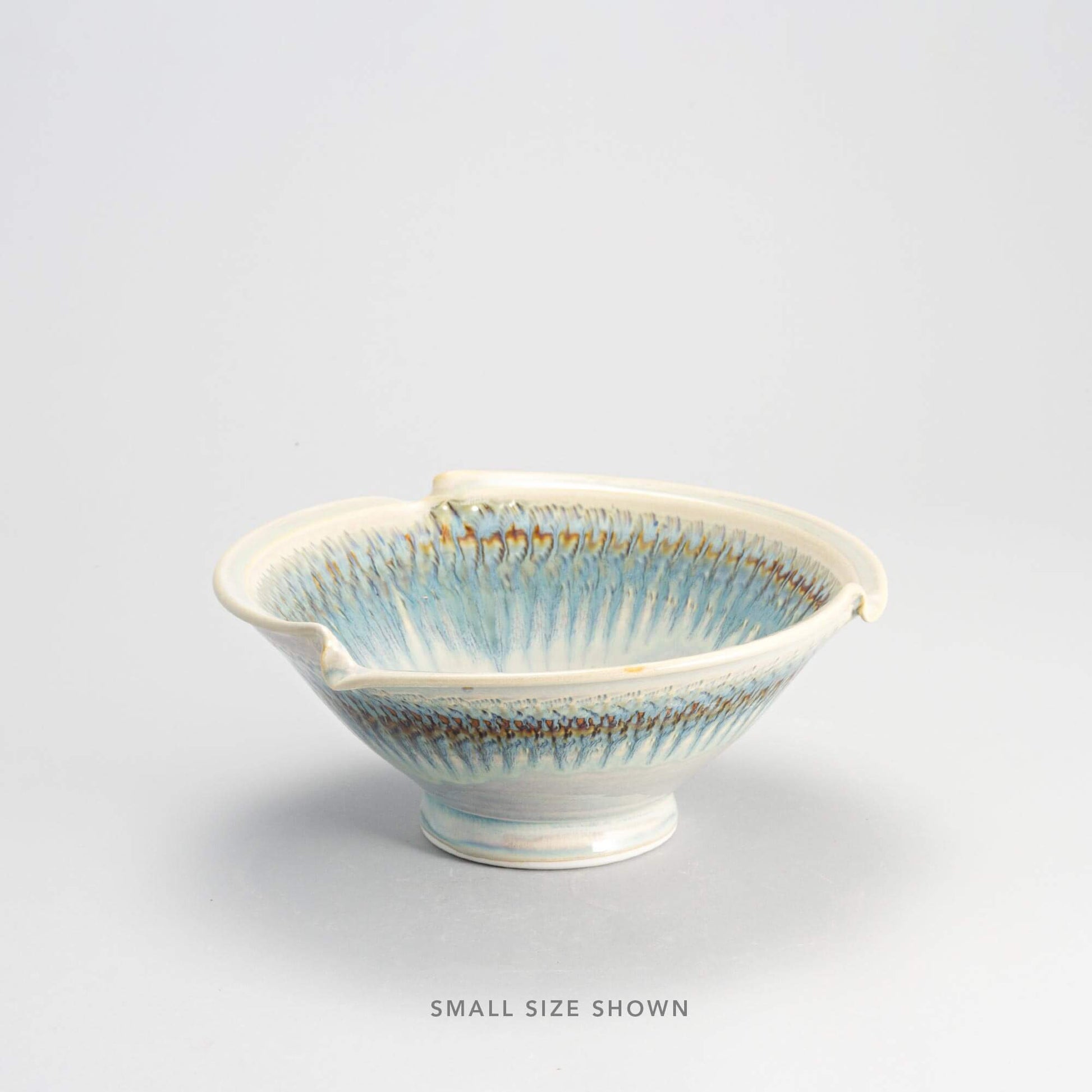 Handmade Pottery Signature Wave Bowl in Ivory & Blue pattern made by Carroccia Tony  in Italy