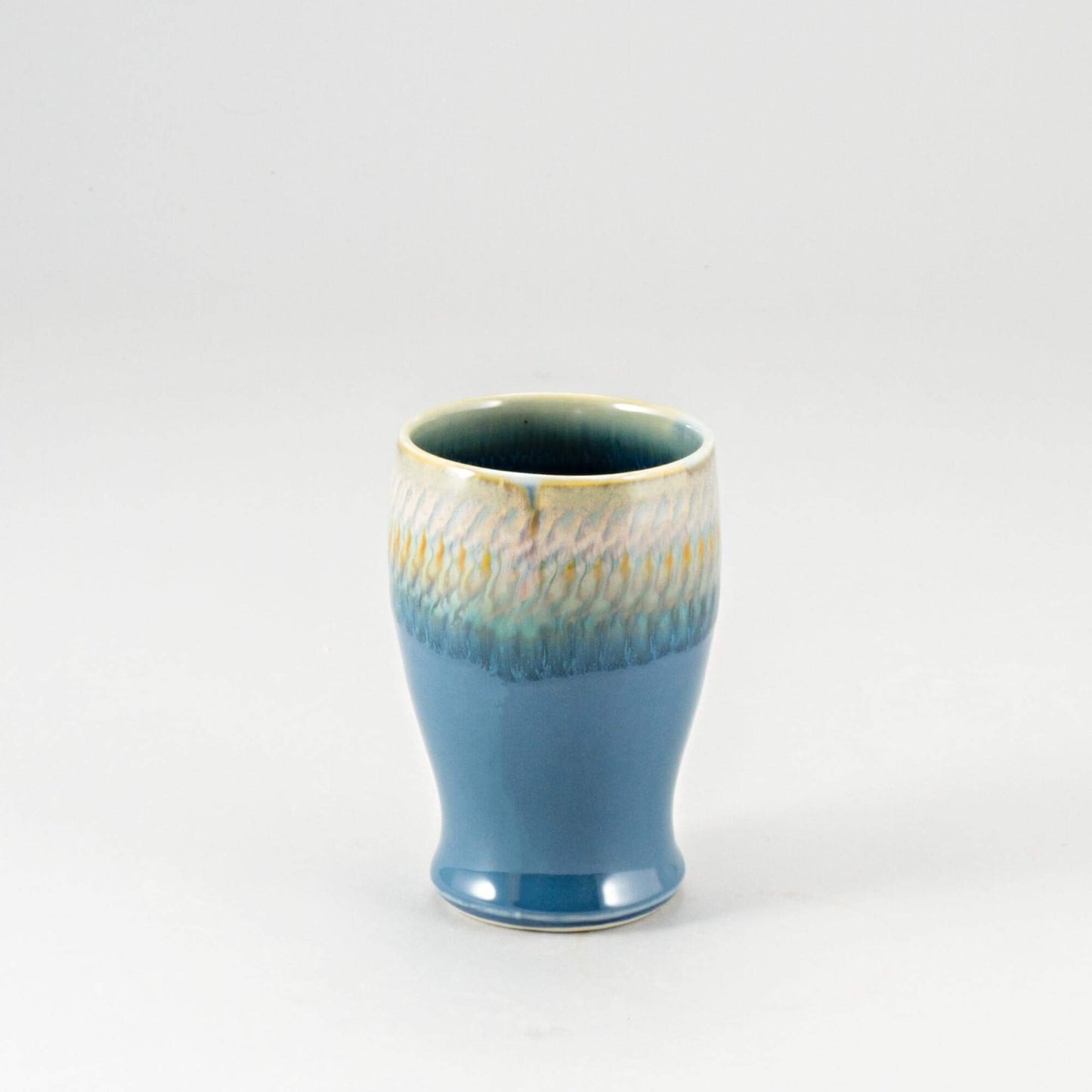 Handmade Pottery Curvy Tumbler in Blue Oribe pattern made by Carroccia Tony in Italy