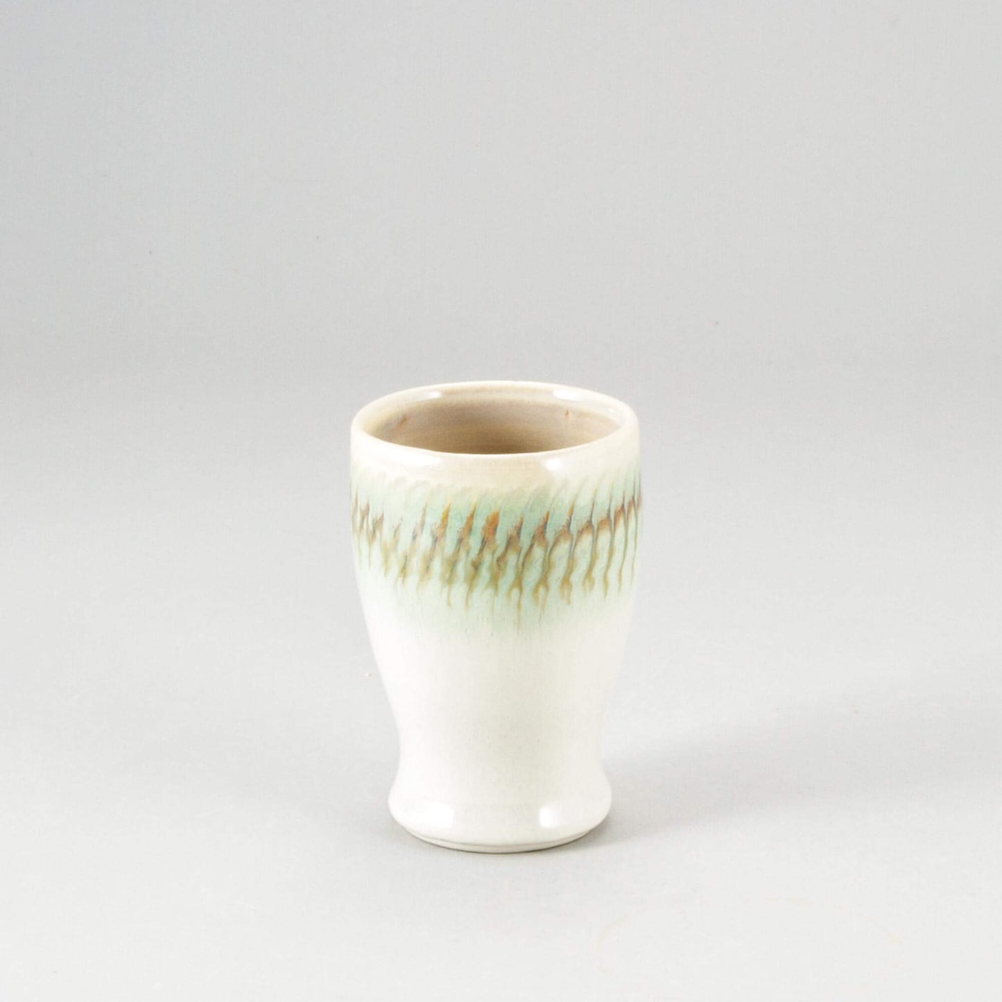 Handmade Pottery Curvy Tumbler in Ivory & Green pattern made by Carroccia Tony in Italy