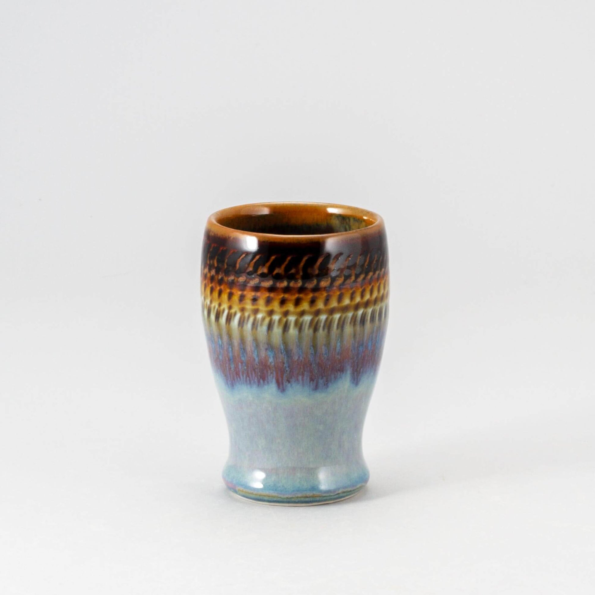 Handmade Pottery Curvy Tumbler in Purple Hamada pattern made by Carroccia Tony in Italy